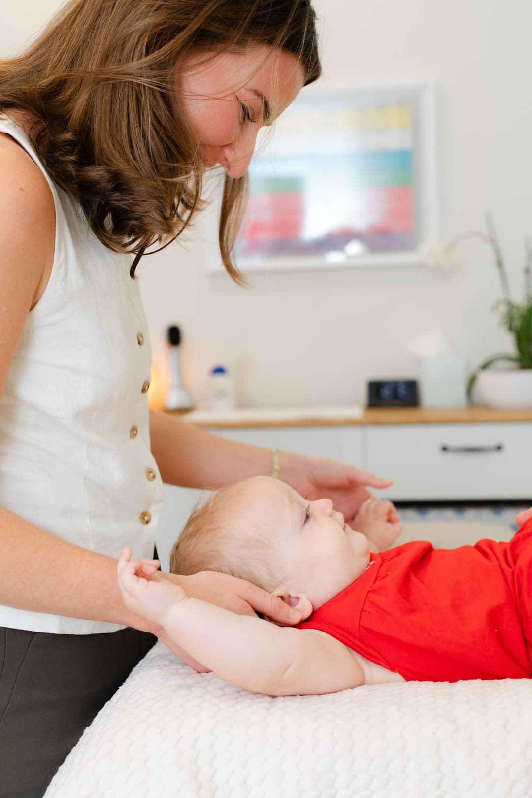 Dr. Mazza performing a gentle adjustment on an infant