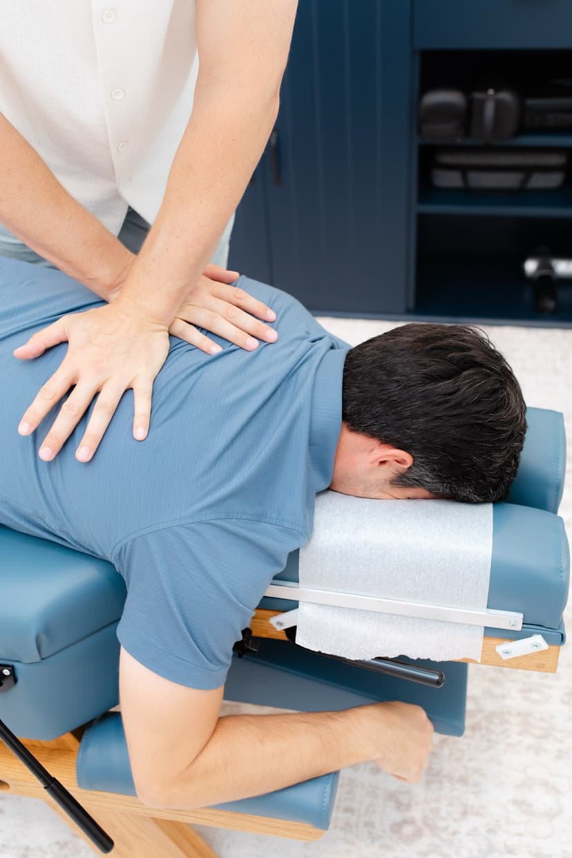 Dr. Gorgi performing a thoracic spine adjustment